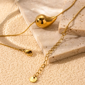 Polished gold stainless steel teardrop pendant necklace on fine snake chain jewelry