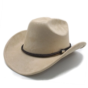 Detail of beige faux suede cowboy hat showing textured crown and braided brown band