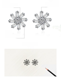 Macro detail of S925 sterling silver snowflake earrings featuring 5A grade zircon stones