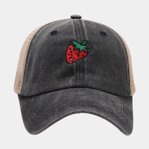 Detail of strawberry embroidery on retro mesh panels of the vintage baseball cap