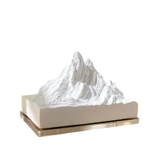 Diffuseur de parfum pierre Alpes montagne enneigée blanche avec socle carré sur acrylique