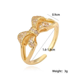 Adjustable gold plated bow ring with micro-pave white zircon crystals for women