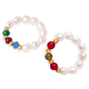 Handmade freshwater pearl ring set with colorful beads and gold accents on white base