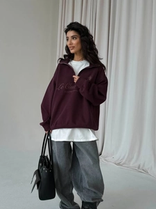 Deep burgundy half-zip pullover sweatshirt with Le Club letter print and relaxed fit style
