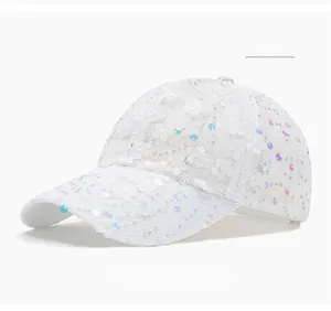 Detail of white mesh baseball cap with 3D lace flowers and shimmering colorful sequins