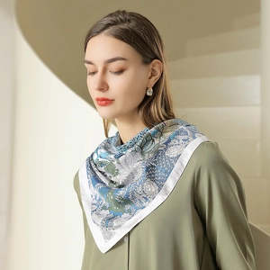 French vintage floral printed silk scarf tied elegantly on a woman's neck for summer