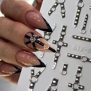 5D embossed dark punk nail stickers featuring metallic rivets and cross strap designs