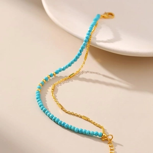Double-layer 18K gold-plated chain bracelet with faceted turquoise beads and adjustable clasp