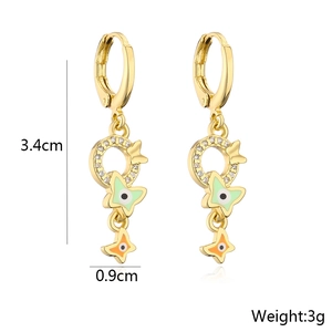 Detail view of 18K gold plated earrings showing dimensions 3.4cm by 0.9cm and 3g weight