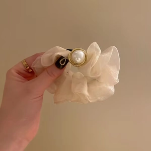 Elegant champagne organza scrunchie with large gold-wrapped pearls for ponytails