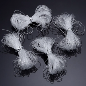 Detailed view of transparent elastic beading cords for DIY handmade jewelry crafting