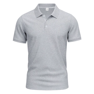 Detailed view of grey piqué polo shirt fabric texture with 100% polyester XXL size label
