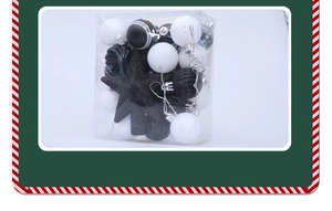 Detail of 31-piece black and white Christmas ball set with assorted textures in a clear box