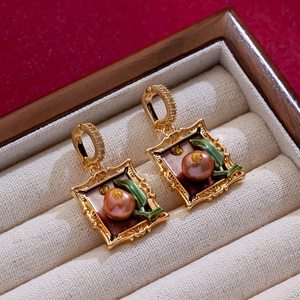 Vintage palace style enamel flower earrings with pearls on beige jewelry display box
