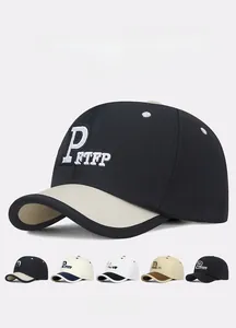 Close-up of color-block baseball cap with 3D letter embroidery and multi-color options