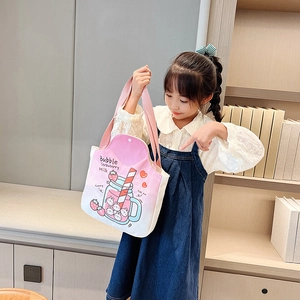 Pink strawberry milk canvas tote bag for girls featuring cute cartoon graphics