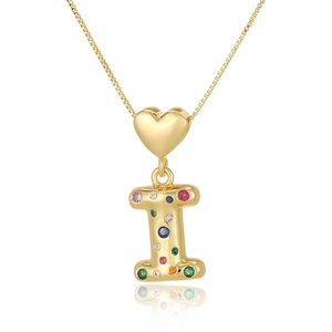 Macro shot of gold letter I pendant with heart clasp and colorful zircon stones
