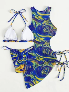 Detail of three-piece bikini set featuring marble print and mesh cover-up skirt