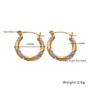 Macro view of 18k gold plated C-shape twist earrings with size and weight details