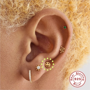 S925 Sterling Silver ear stud set featuring smiley face, star, and snake designs