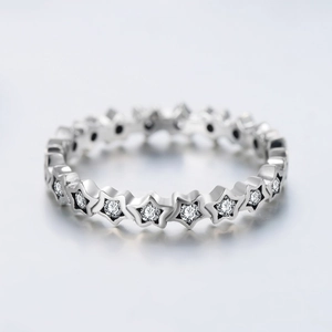 Sparkling S925 sterling silver ring with hollow star patterns and embedded crystals