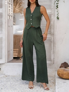 Deep green vest and wide-leg trousers set in lightweight fabric for a casual summer look