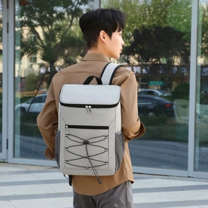 Grey insulated oxford cloth lunch backpack with elastic cord mesh and side pockets