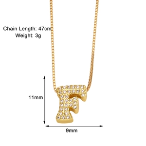 Detail view of gold letter F pendant with zircon stones and 47cm necklace chain size