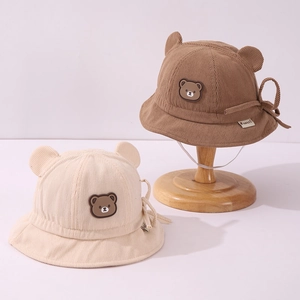 Detail of baby corduroy bucket hats with cute bear ears and windproof chin straps