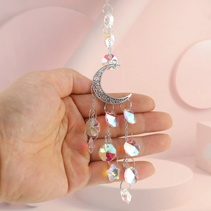 Detail of silver moon suncatcher featuring K9 crystal beads and star teardrop charms