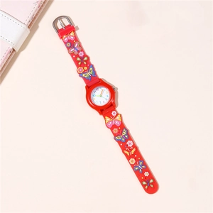 Detailed macro view of colorful butterfly relief on red silicone strap for kids watch