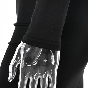 Close-up of the elastic sleeve cuff and precision stitching on the black tight dress