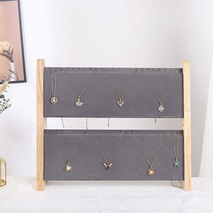 Two-tier wooden necklace display stand with grey velvet bars for jewelry storage