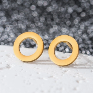 Close-up of minimalist 18K gold hollow circular stud earrings in polished stainless steel