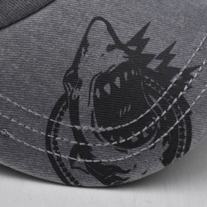 Gray washed cotton baseball cap featuring distressed shark print and white stitching detail