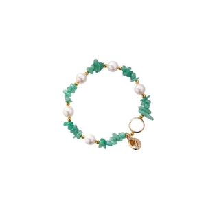 Handmade beach style bracelet with green stones, white pearls and gold shell pendant