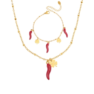 Golden stainless steel jewelry set featuring red pepper and lucky clover pendants