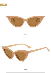 Front and 45-degree side views of cat-eye sunglasses in peach pink with amber lenses