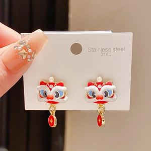 Macro view of 316L stainless steel earrings featuring colorful enamel lion heads