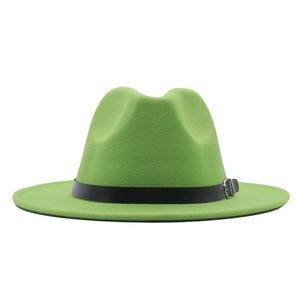 Detail of emerald green felt fedora hat featuring a black leather belt with metal buckle