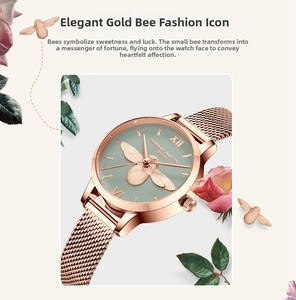 Gros plan d'un relief d'abeille 3D sur cadran gris-vert avec bracelet en maille rose