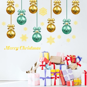 Detailed view of Merry Christmas wall decals with golden ornaments and gift boxes decoration