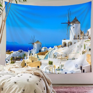 Detailed view of Santorini wall tapestry in bedroom with white buildings and blue domes