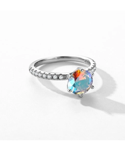 Macro shot of S925 silver ring featuring a rainbow zircon set in a six-prong mount