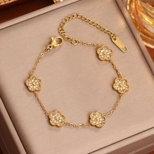 Élégant bracelet fleurs à cinq pétales plaqué or 18 carats avec zircons et fermoir réglable