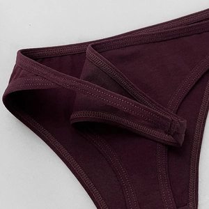 Sexy dark plum ribbed cotton thong with thin straps and detailed double stitching