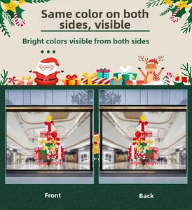 Close-up of double-sided Christmas gift box window stickers with Merry Christmas text