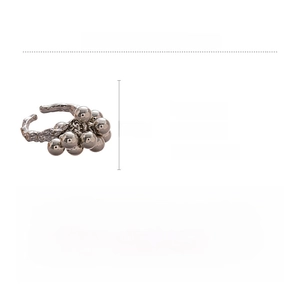 Detailed view of silver irregular sphere ring showing 3.5cm by 2cm dimensions and 4.6g weight