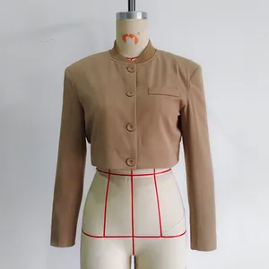 Front view of a slim-fit tan cropped jacket with a ribbed collar and button-down front