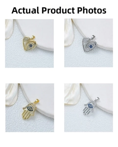 Macro detail of Hamsa hand and heart charms with pavé crystals and evil eye design